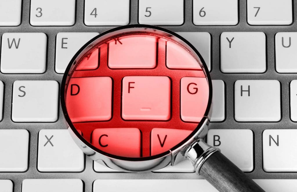 WP Creative, Design and Marketing Agency Suffolk, SEO Services, Magnify Glass on a Keyboard